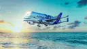 هواپیمای ترابری ایرباس بلوگا (Airbus Beluga) در حال پرواز بر فراز دریا