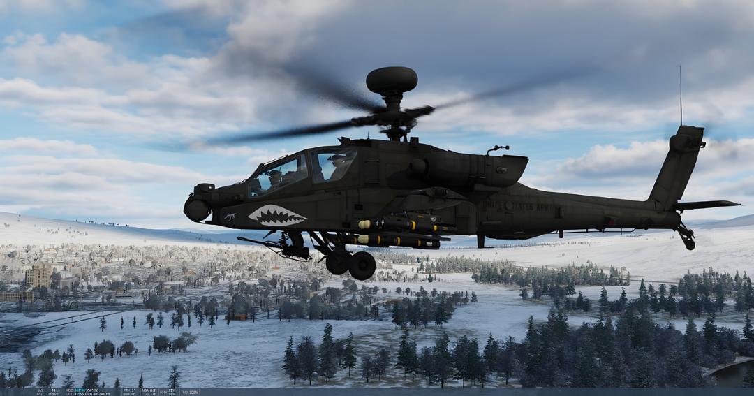 بالگرد تهاجمی آپاچی (AH-64 Apache) در حال پرواز بر فراز منظره‌ای برفی