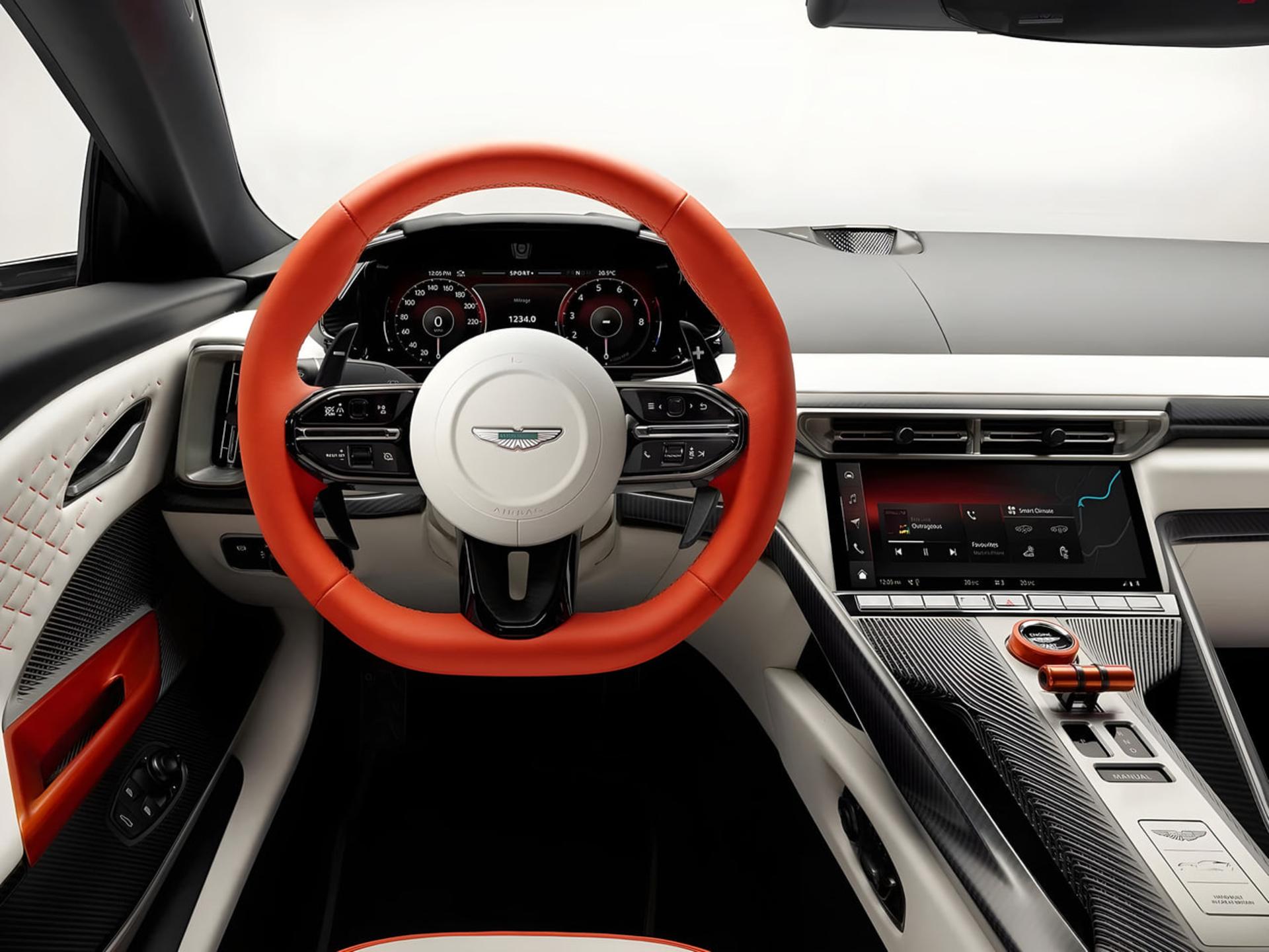 کابین خودروی استون مارتین ولن (Aston Martin ) با فرمان نارنجی و کنسول کربن