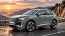 خودرو برقی آئودی Q4 ای‌ترون (Audi Q4 e-tron) در جاده‌ای کوهستانی هنگام غروب