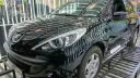 خودرو پژو ۲۰۷ (Peugeot 207) مشکی در نمایشگاه خودرو