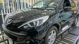 خودرو پژو ۲۰۷ (Peugeot 207) مشکی در نمایشگاه خودرو