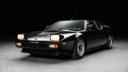 خودرو اسپرت بی‌ام‌و M1 (BMW M1) با رنگ مشکی و چراغ‌های روشن