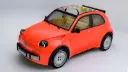 خودروی نارنجی رنگ سیتروئن (Citroën 2CV) با پیشرانه‌ی الکتریکی و سقف شیشه‌ای