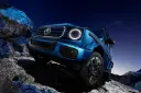 خودرو مرسدس بنز کلاس جی (Mercedes-Benz G-Class) آبی رنگ در مسیر صخره‌ای