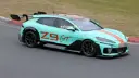 خودرو بی‌وای‌دی دنزا Z9 GT (Denza Z9 GT) با بدنه آیرودینامیک در حال حرکت در پیست