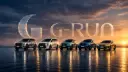 مجموعه‌ای از خودروهای برند جی-ران (G-RUN) در مقابل آسمان غروب