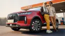 خودرو ام‌وی‌ام X5 (MG X5) قرمز رنگ در مقابل کارواش