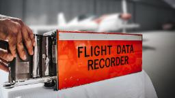 جعبه سیاه هواپیما (Flight Data Recorder) با بدنه نارنجی پررنگ