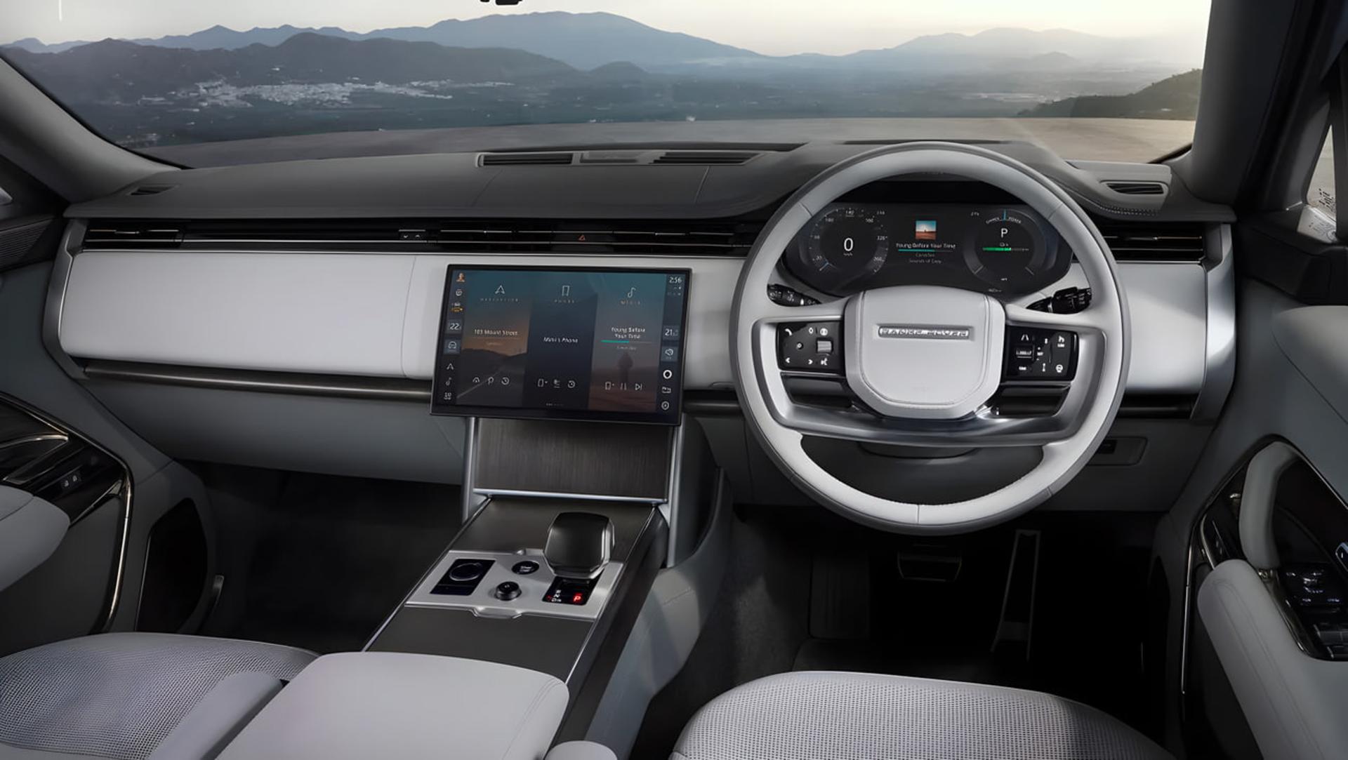 داشبورد و فرمان خودروی رنج‌روور (Range Rover) با طراحی مدرن و دیجیتال