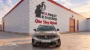 خودرو شاسی‌بلند رنو گرند کولئوس (Renault Grand Koleos) مقابل ساختمان ماموت خودرو