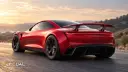 باله متحرک و سیستم آیرودینامیکی خودروی تسلا (Tesla) رودستر در هنگام غروب