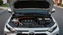 موتور و قطعات سیستم هیبریدی خودروی تویوتا (Toyota) با کابل‌های نارنجی