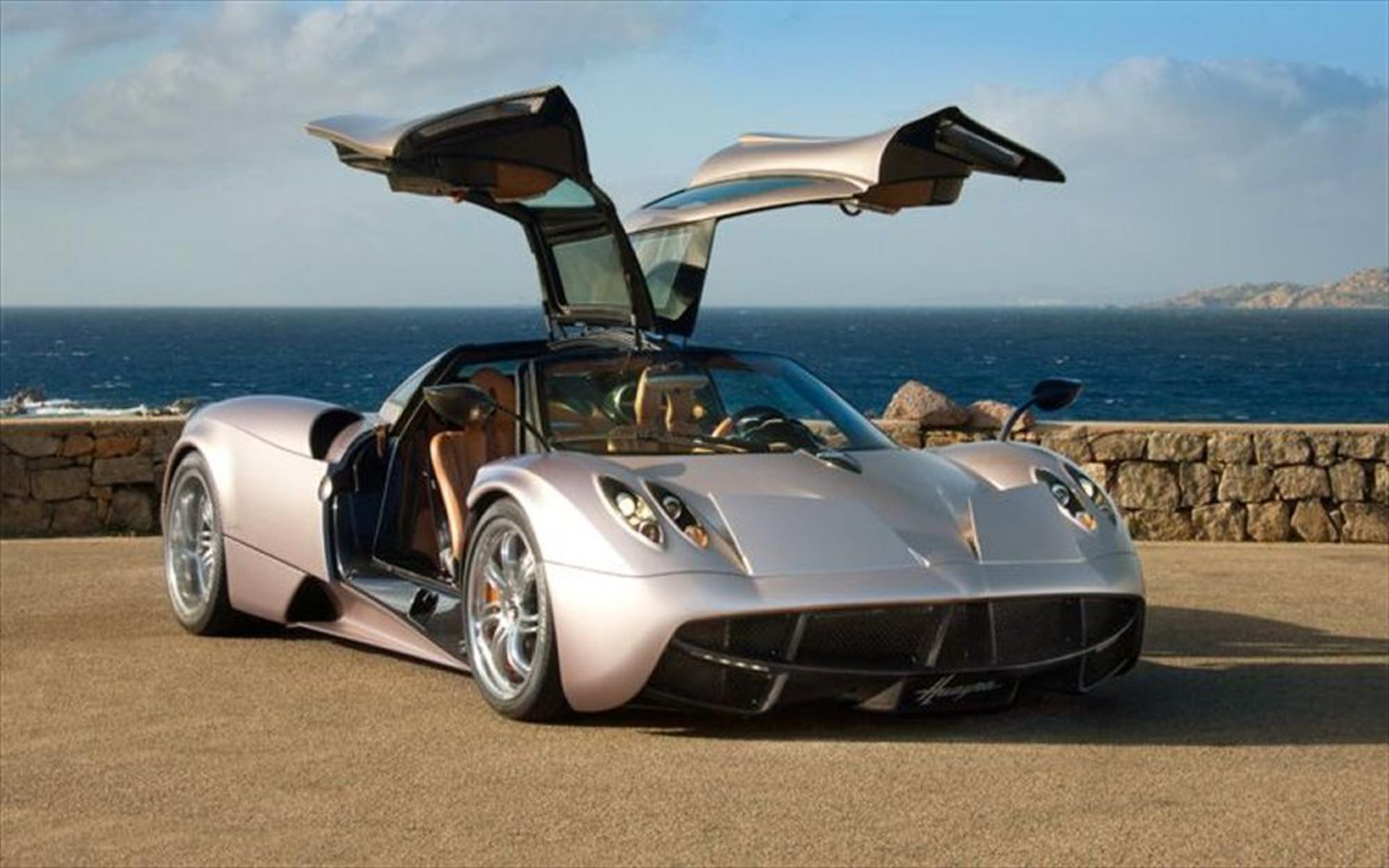 2012-pagani-huayra-front-three-quarters-view-doors-open1