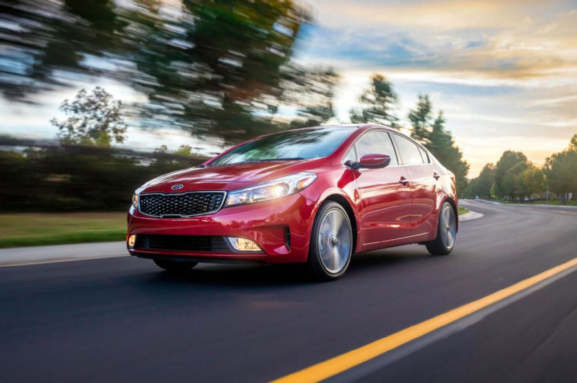 2017-kia-forte-sedan-front-three-quarter-in-motion