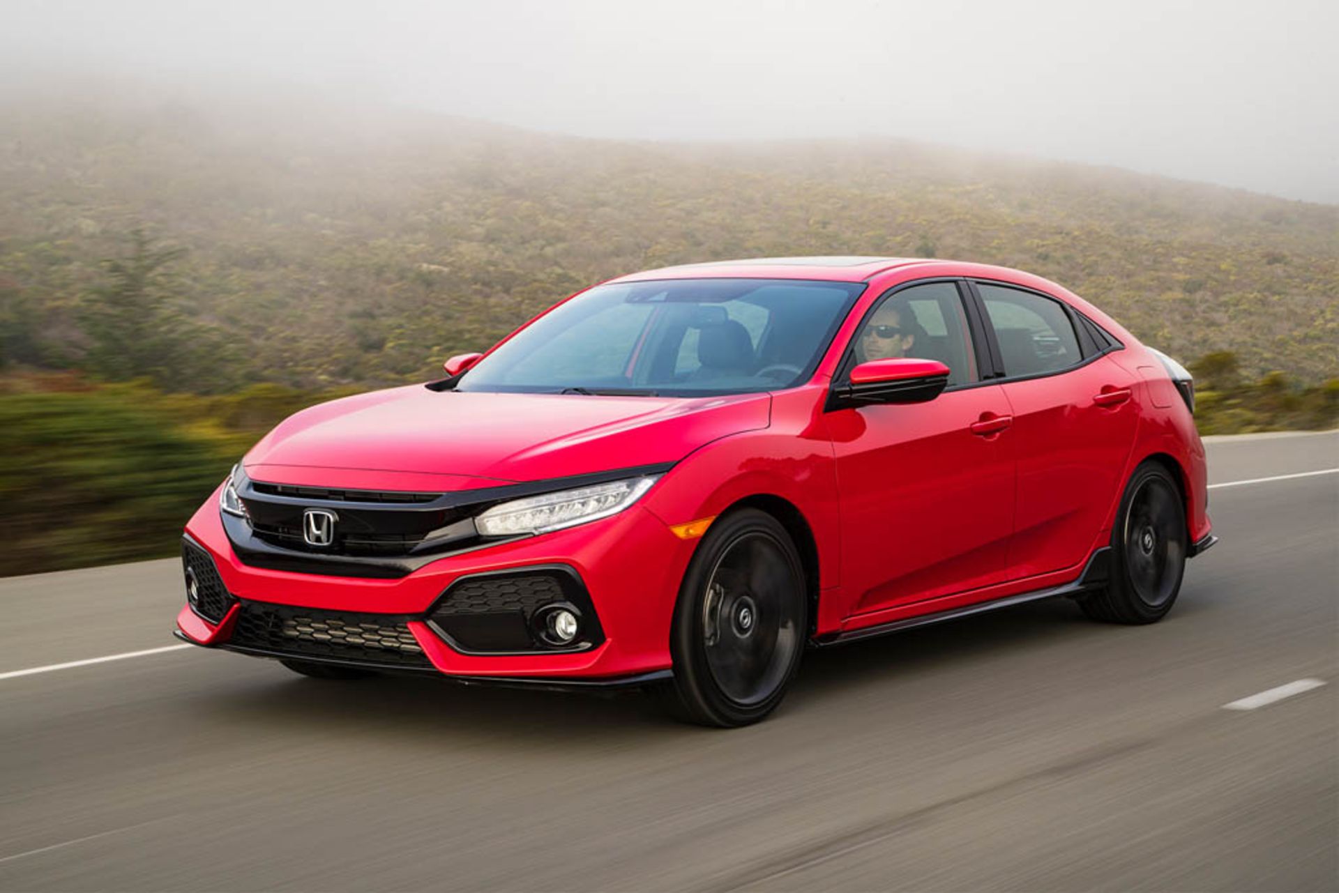 2017-Honda-Civic-Sport-Touring-Hatchback-front-three-quarter-in-motion-01-1