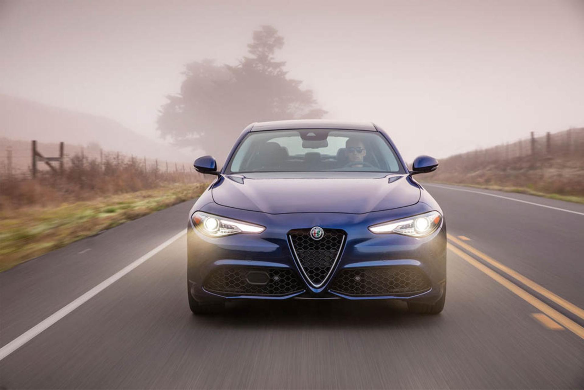 2017-alfa-romeo-giulia-ti-front-view-in-motion-03