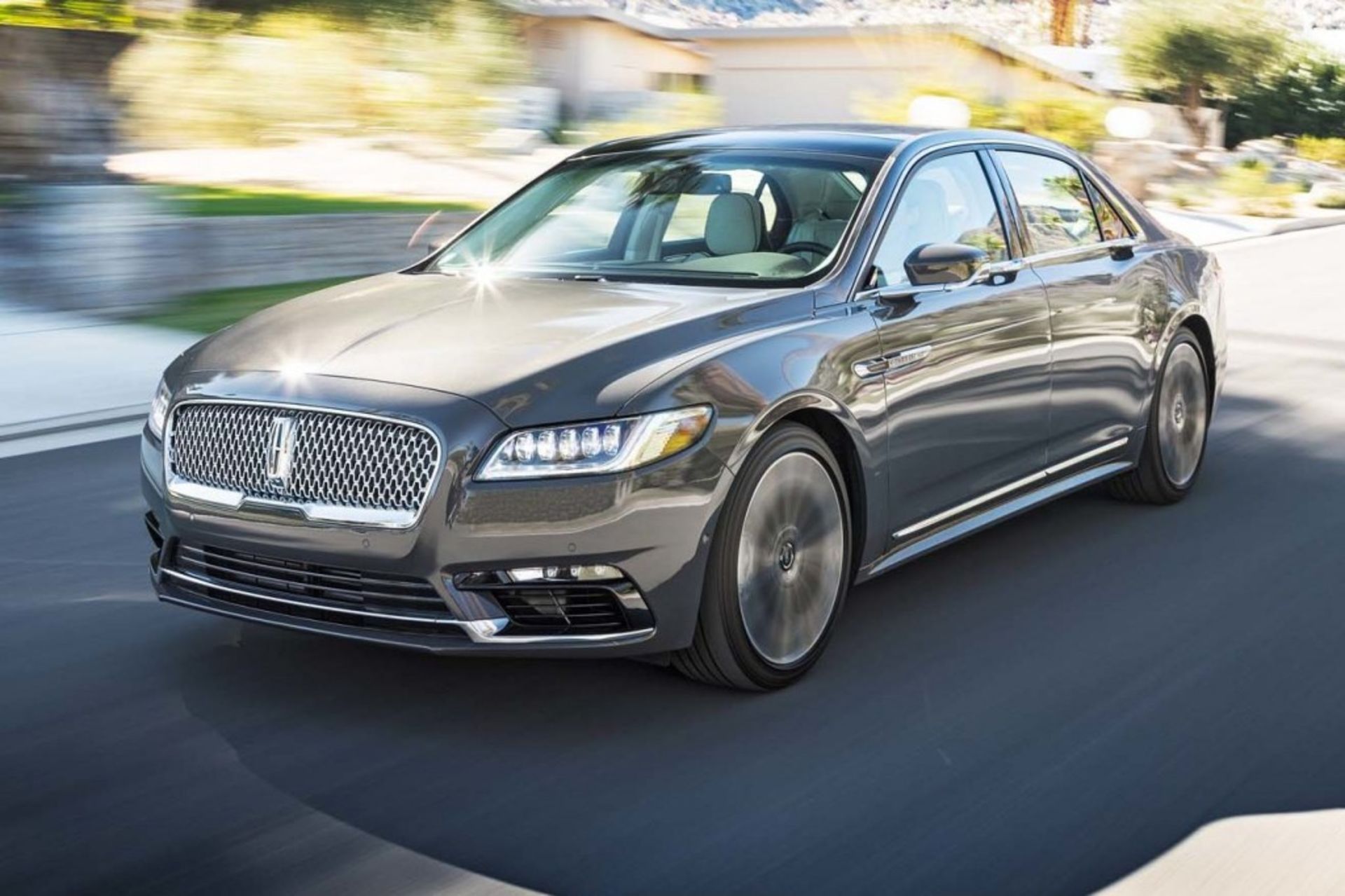 2017-lincoln-continental-30t-awd-front-three-quarter-in-motion-02-