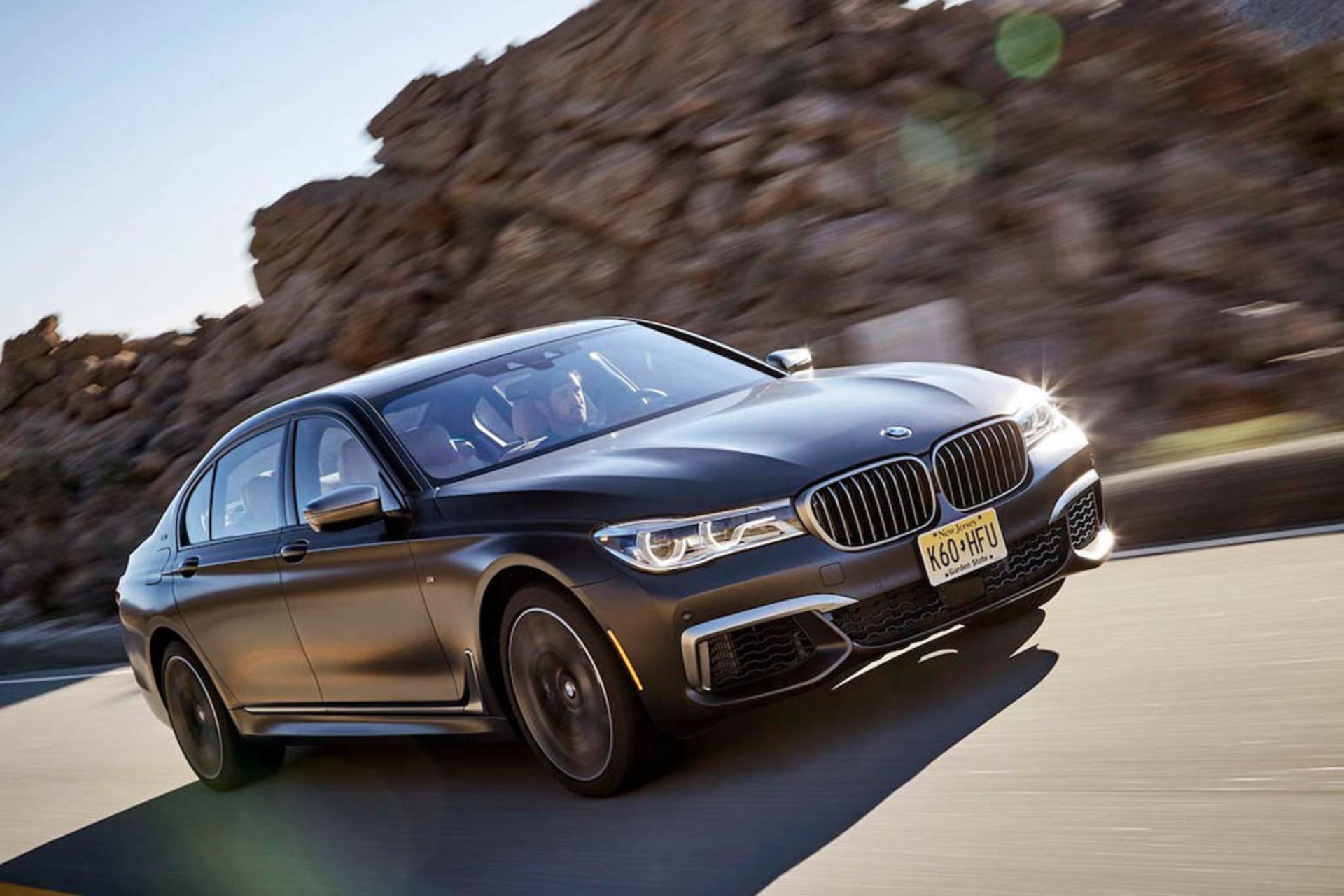 2017-BMW-M760i-xDrive-front-three-quarter-in-motion-02