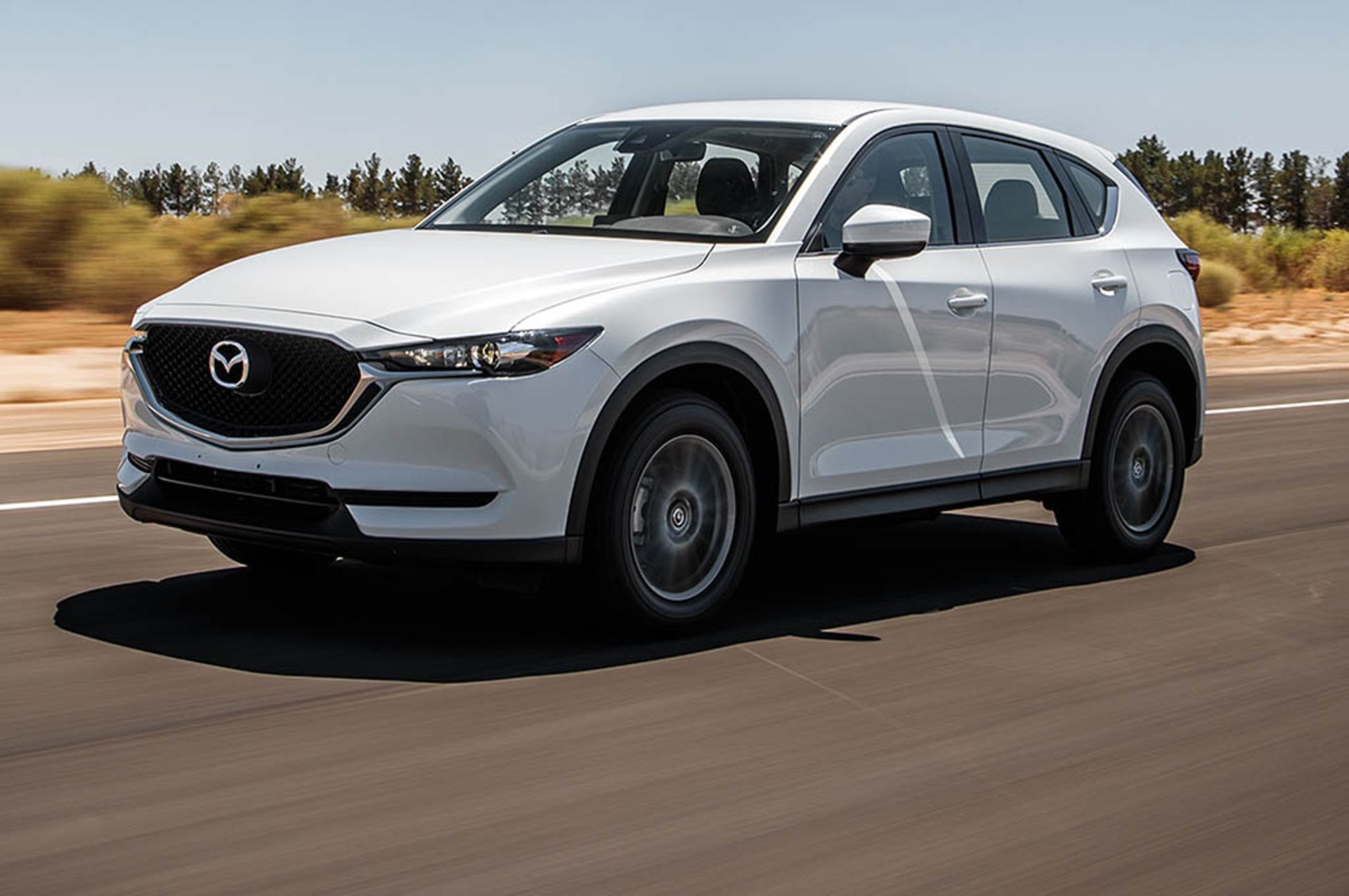 2018-Mazda-CX-5-AWD-front-three-quarter-in-motion-00