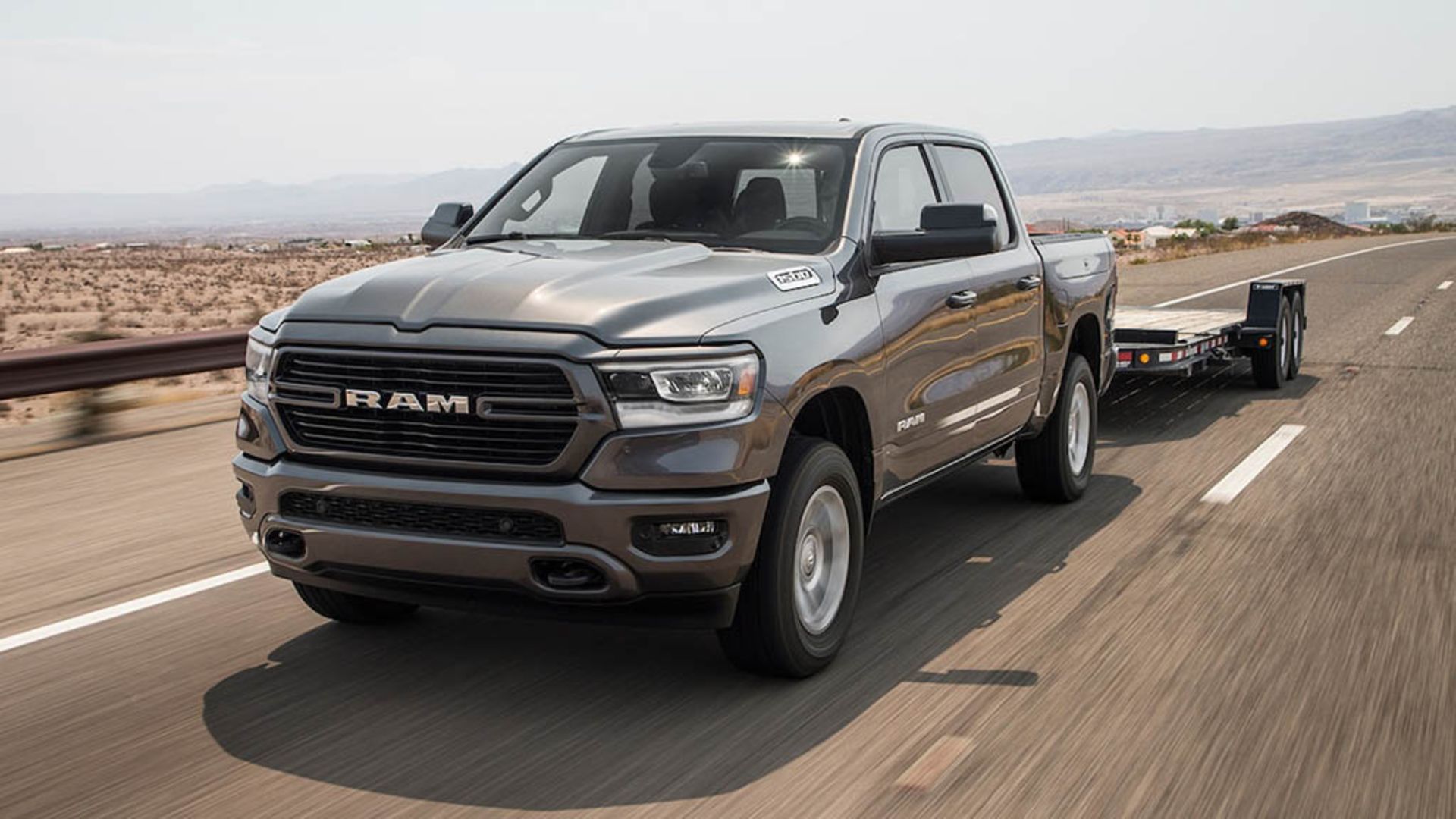 8 - 2019-Ram-1500-Big-Horn-4x4-V-6-eTorque-front-three-quarter-in-motion-2