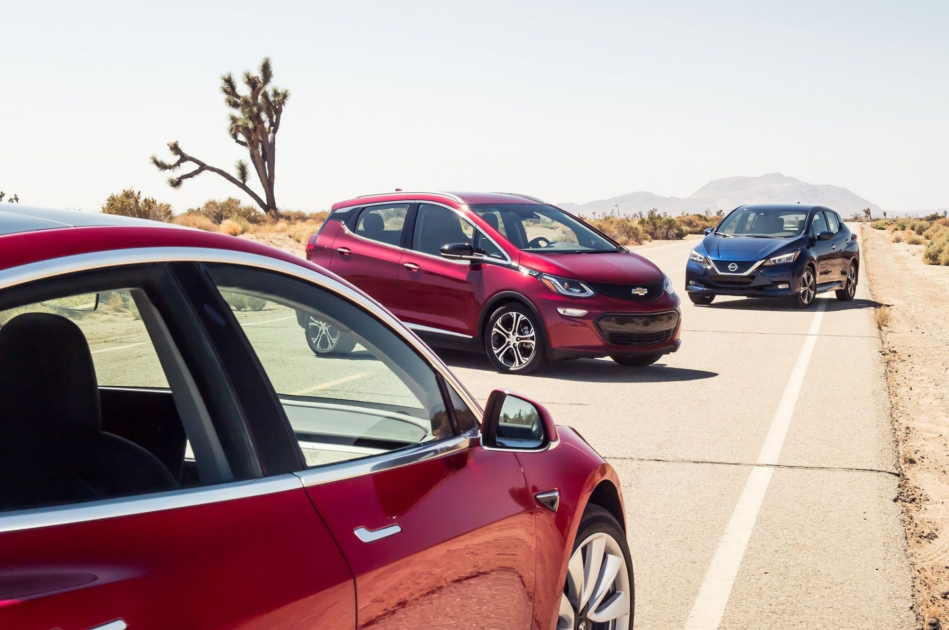 tesla vs nissan vs 2021 bolt