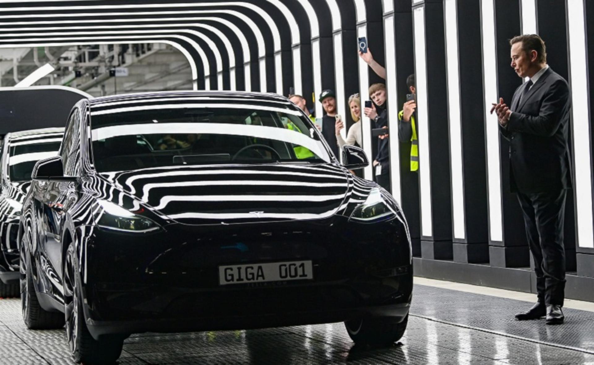 Elon Musk attends the opening ceremony of the new Tesla Gigafactory for electric cars in Gruenheide, Germany, March 22, 2022. Patrick Pleul/Pool via REUTERS - RC2Q7T954STN