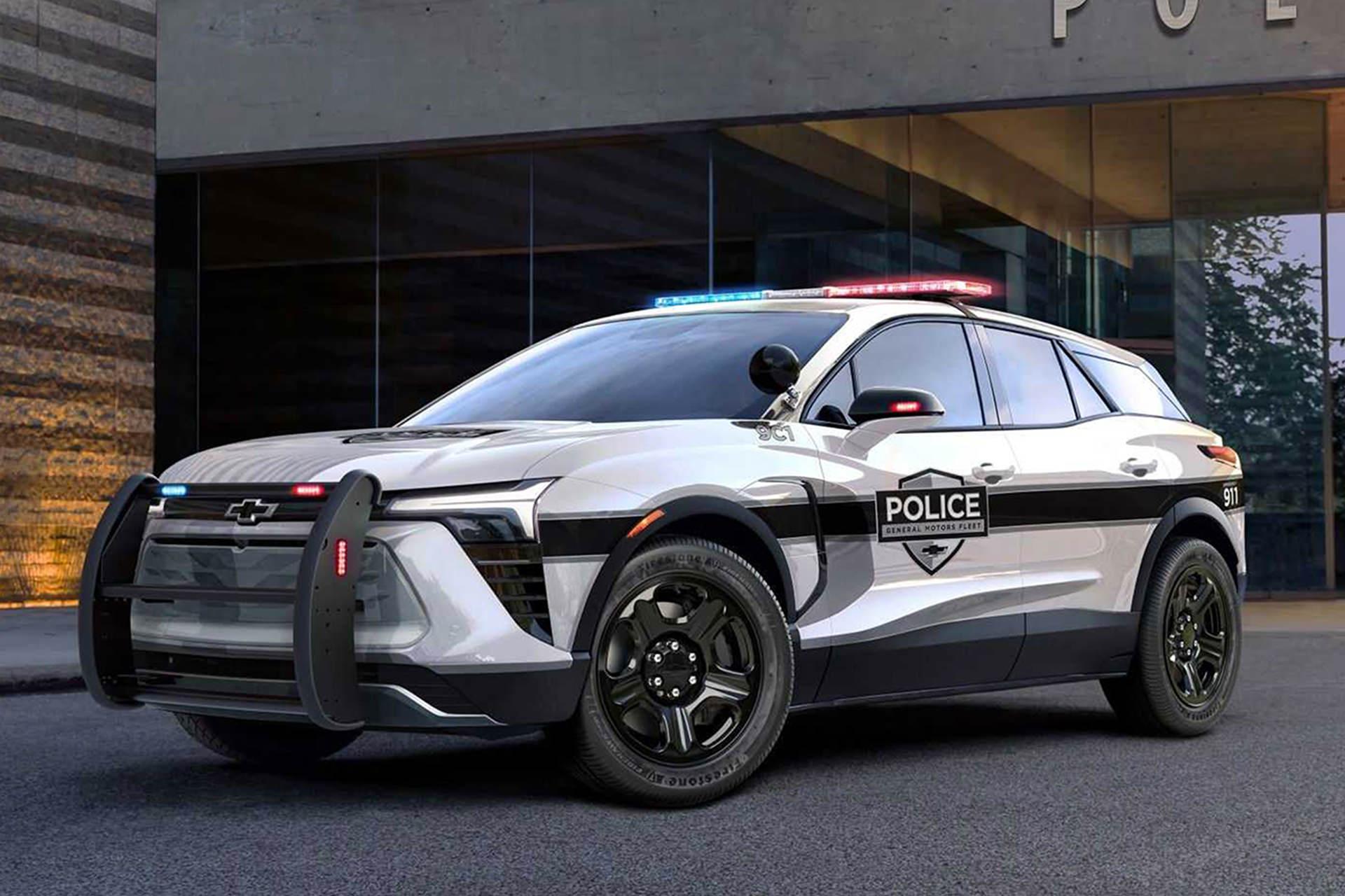2024-chevrolet-blazer-ev-police-pursuit-vehicle-exterior-front-three-quarter-view-outside-police-station