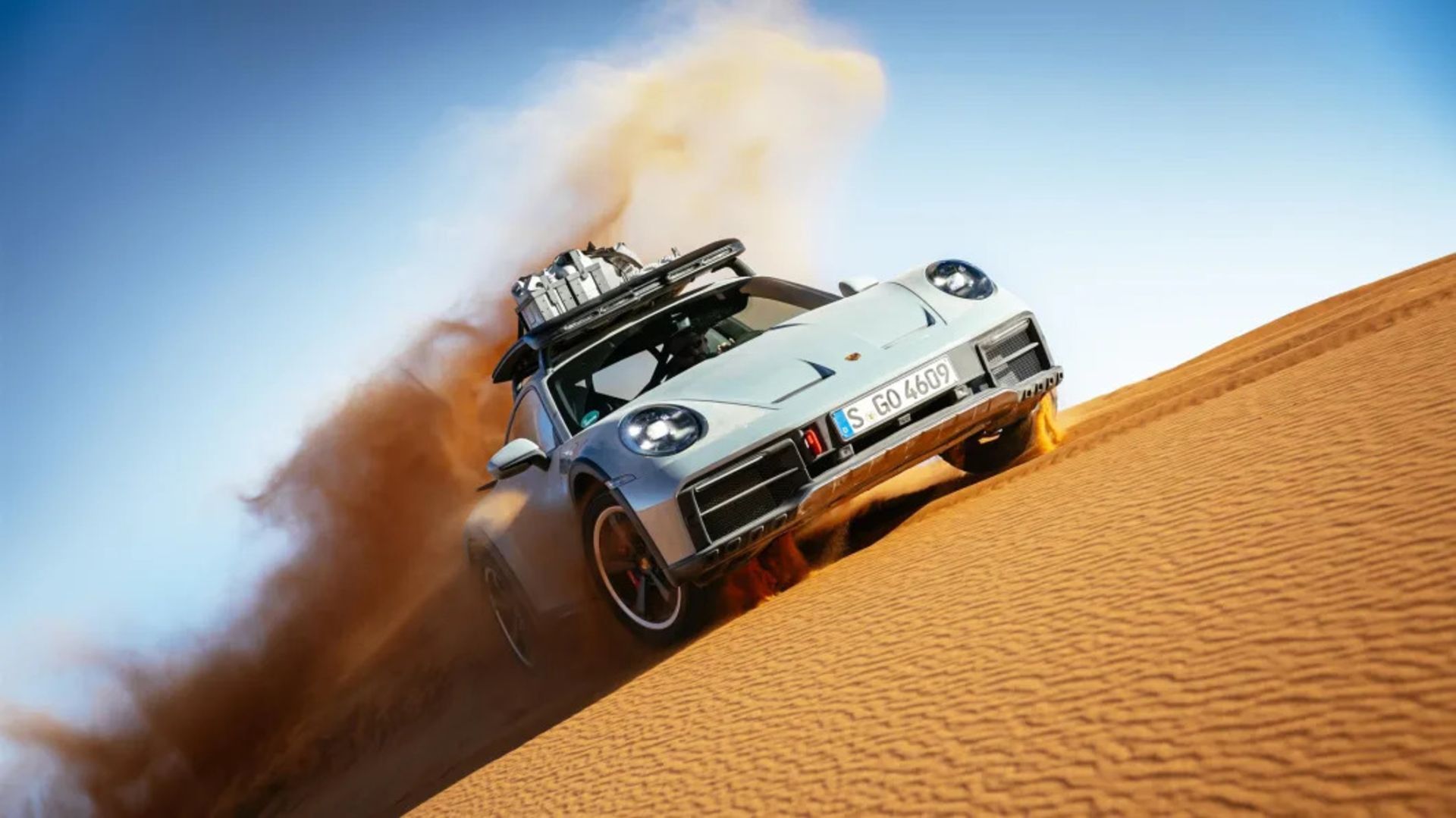 2023-Porsche-911-Dakar-in-Shade-Green-front-on-dune