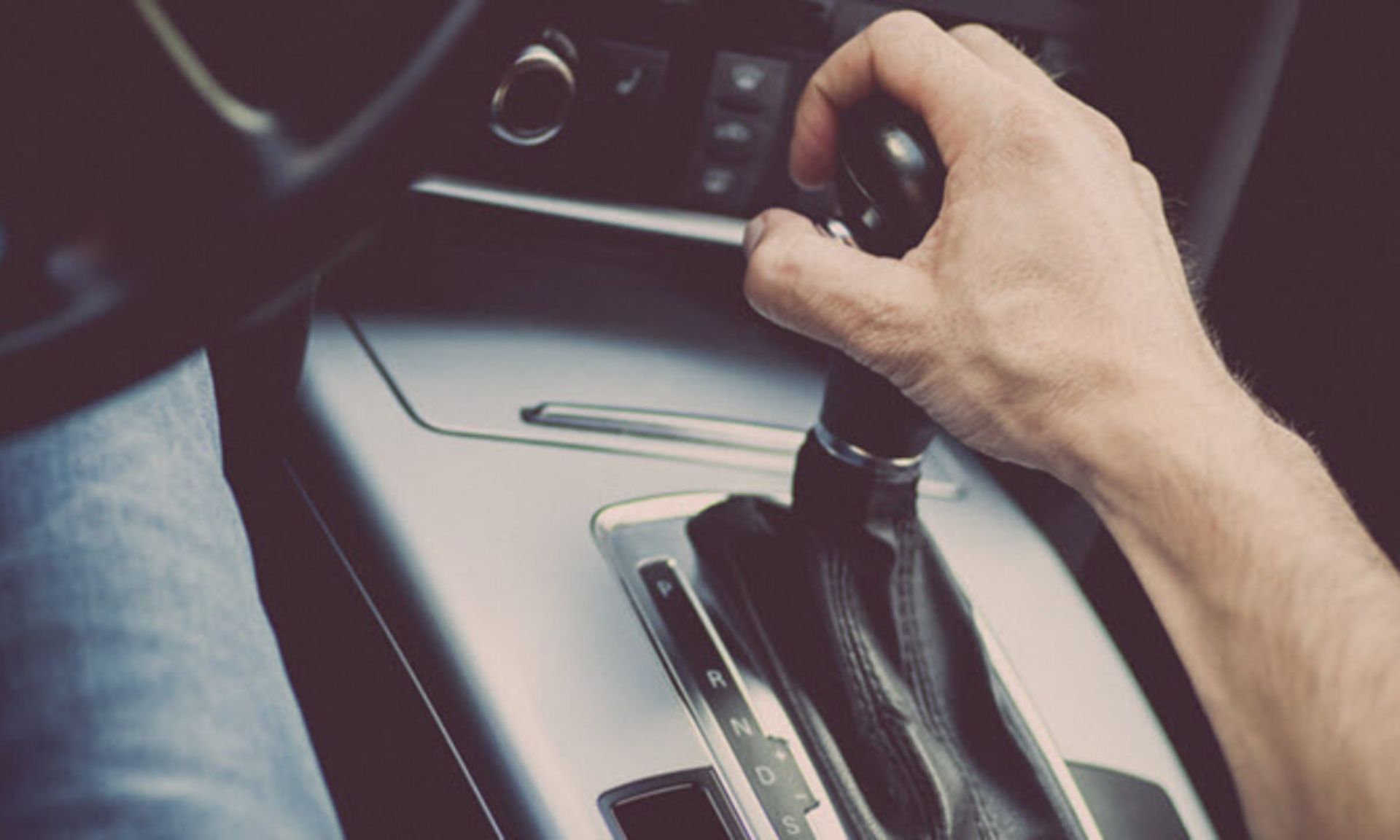 Hand-on-Car-Gear-Stick-1200x720