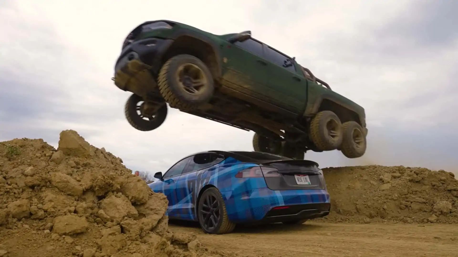 ram-trx-jumps-over-tesla-model-s