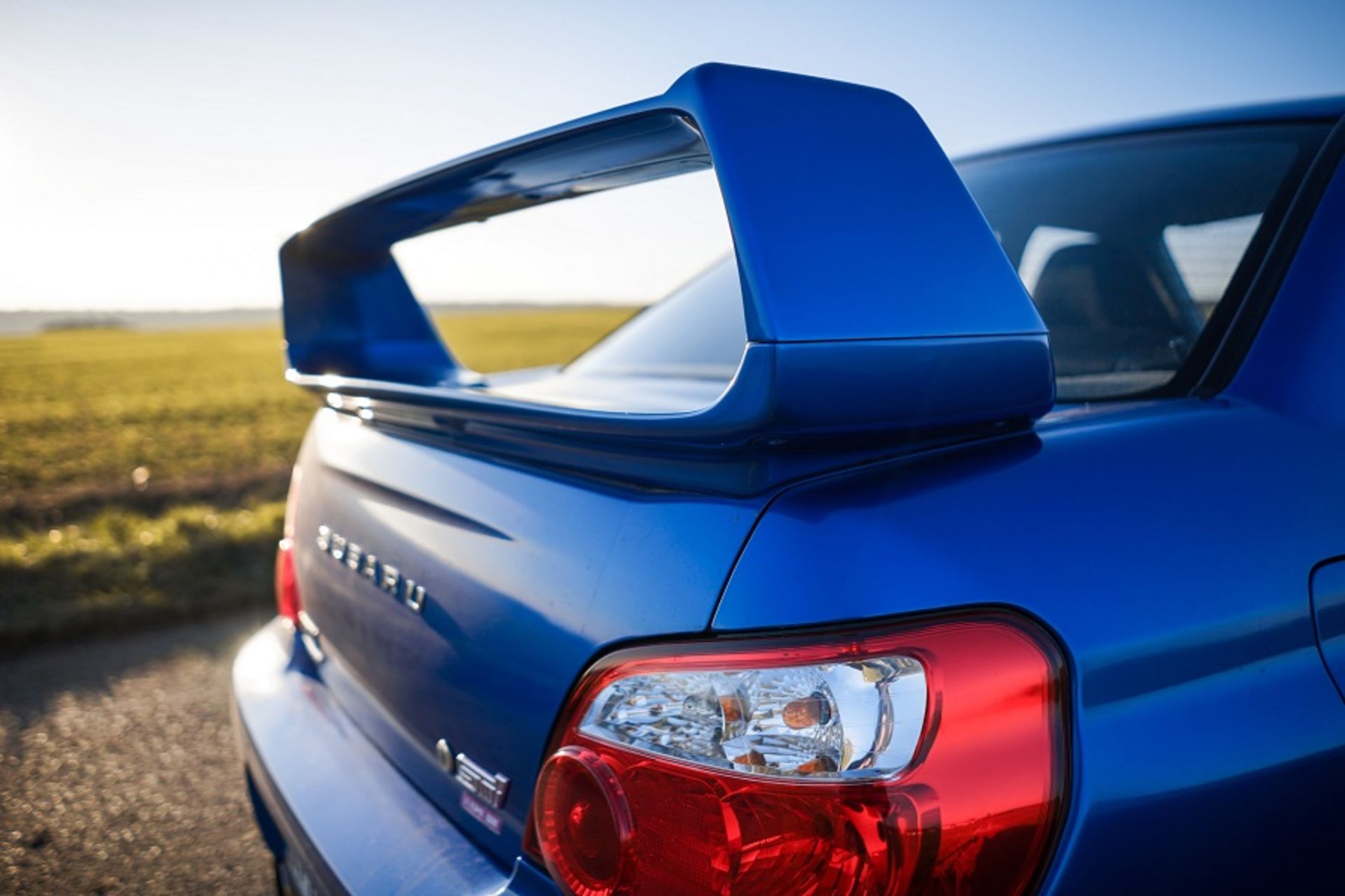 60d199eff107243823b37cfb_What_Are_Car_Wings_and_Spoilers.original