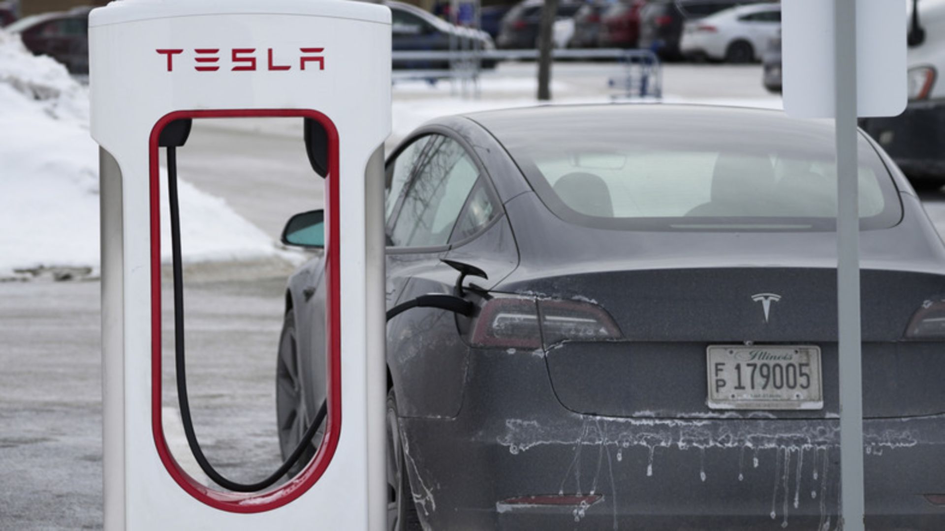 Tesla Supercharger is seen in Rolling Meadows, Ill., Monday, Jan. 30, 2023. (AP Photo/Nam Y. Huh)