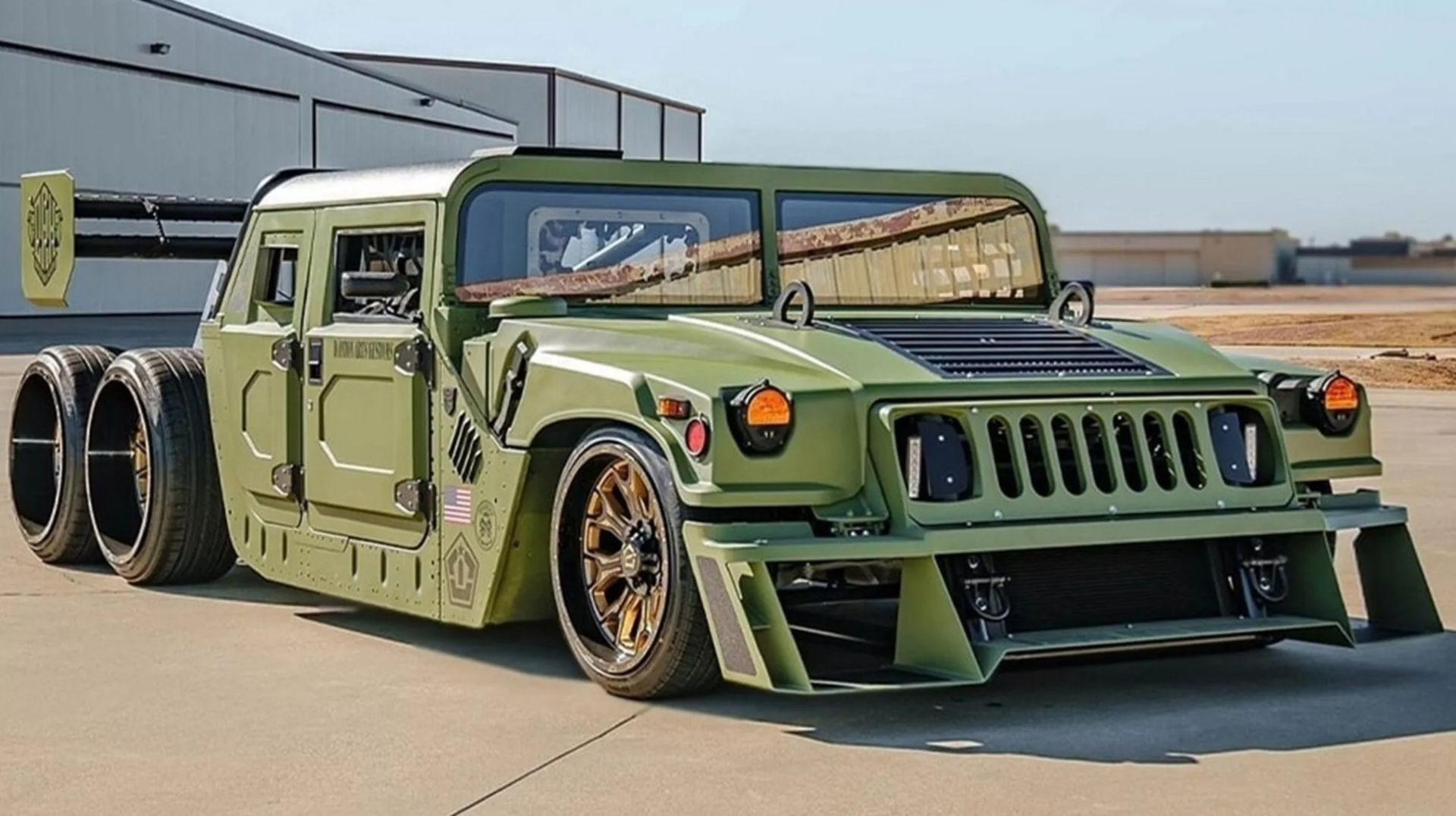 the-world-s-first-6x6-humvee-has-a-hellcat-v8-under-the-hood-and-an-aircraft-wing-227866_1