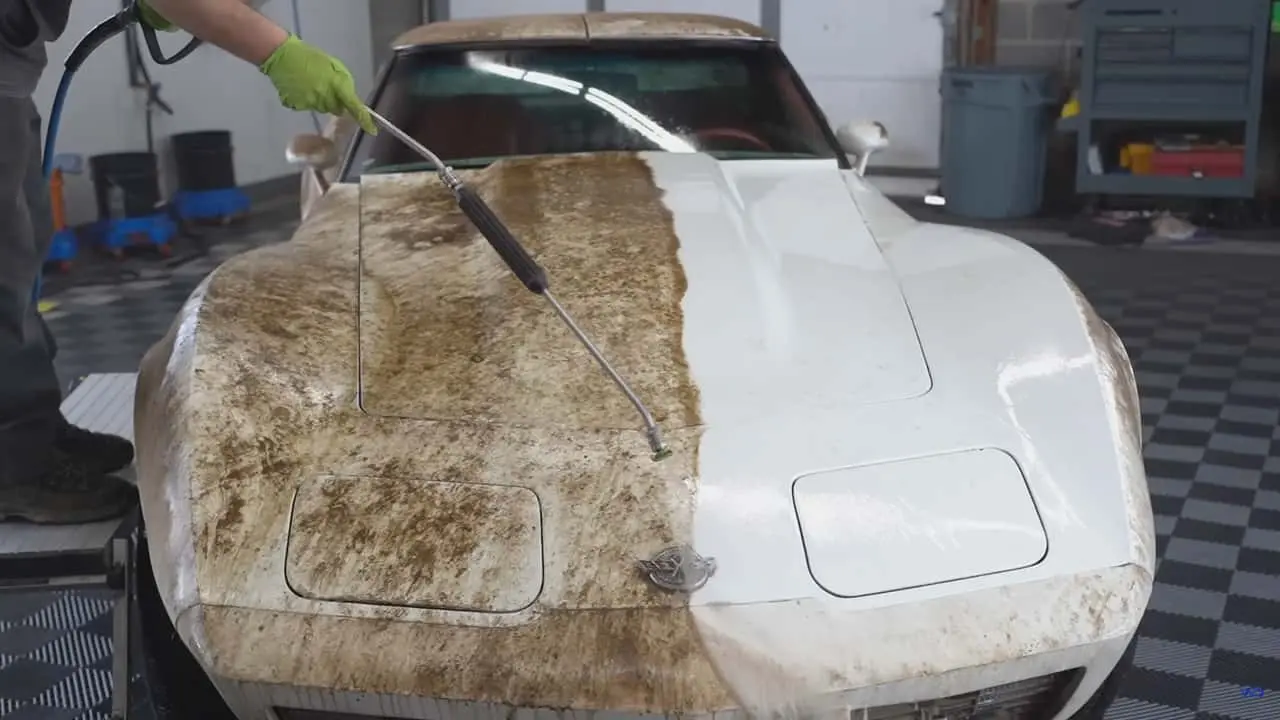 1978-chevrolet-corvette-being-cleaned-of-dirt-by-a-pressure-washer