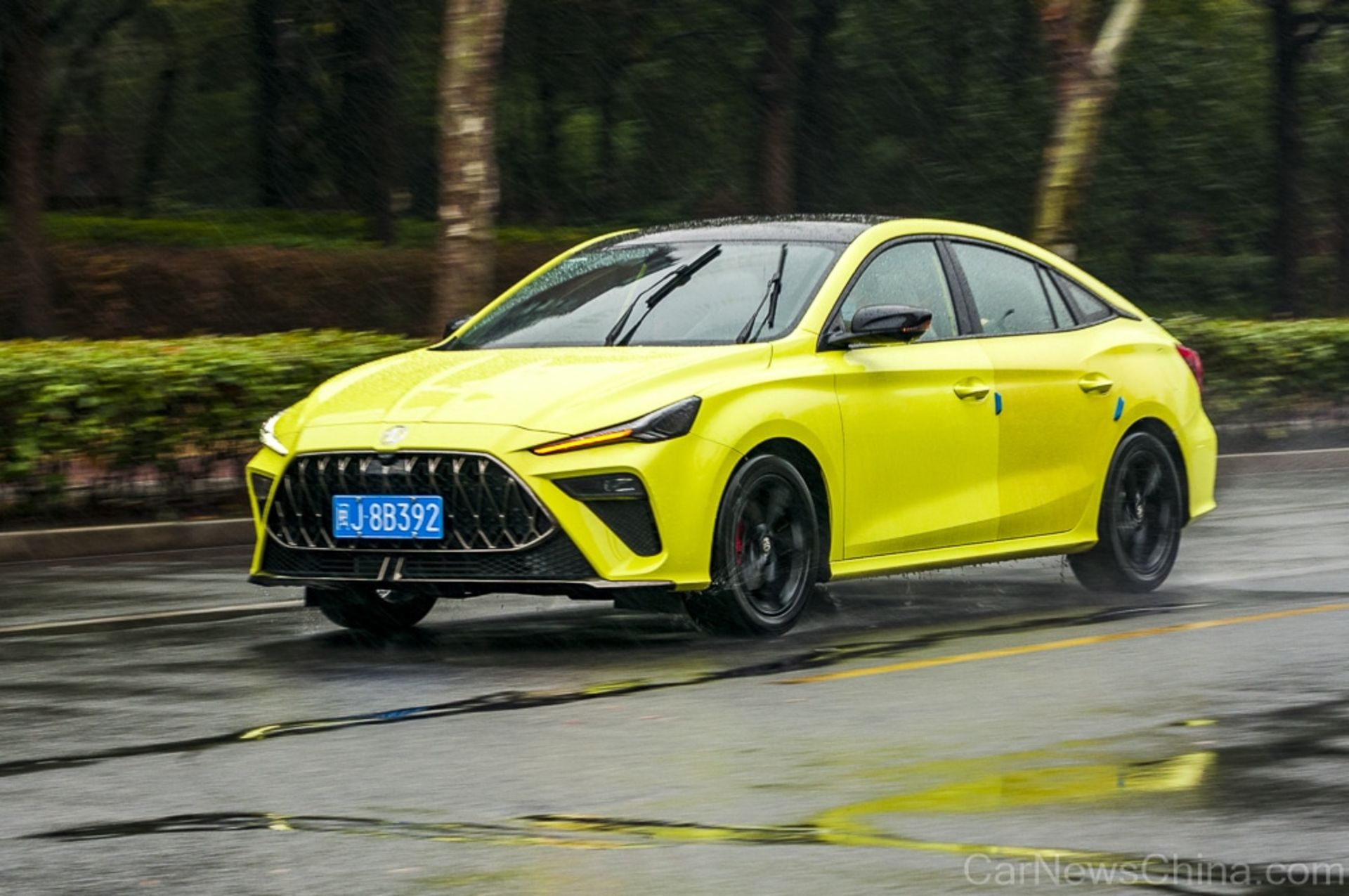 Shanghai, China – 01132023: A Chinese MG 5 Scorpio sedan being driven on a test drive in Shanghai.