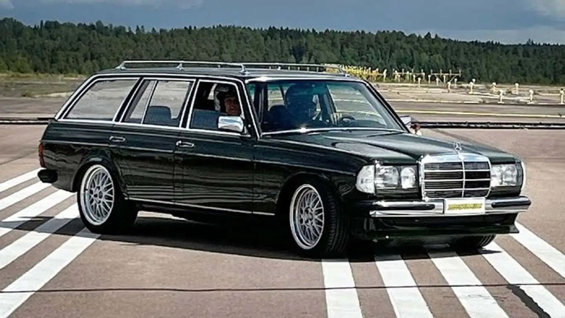 mercedes-w123-wagon-sitting-on-a-runway