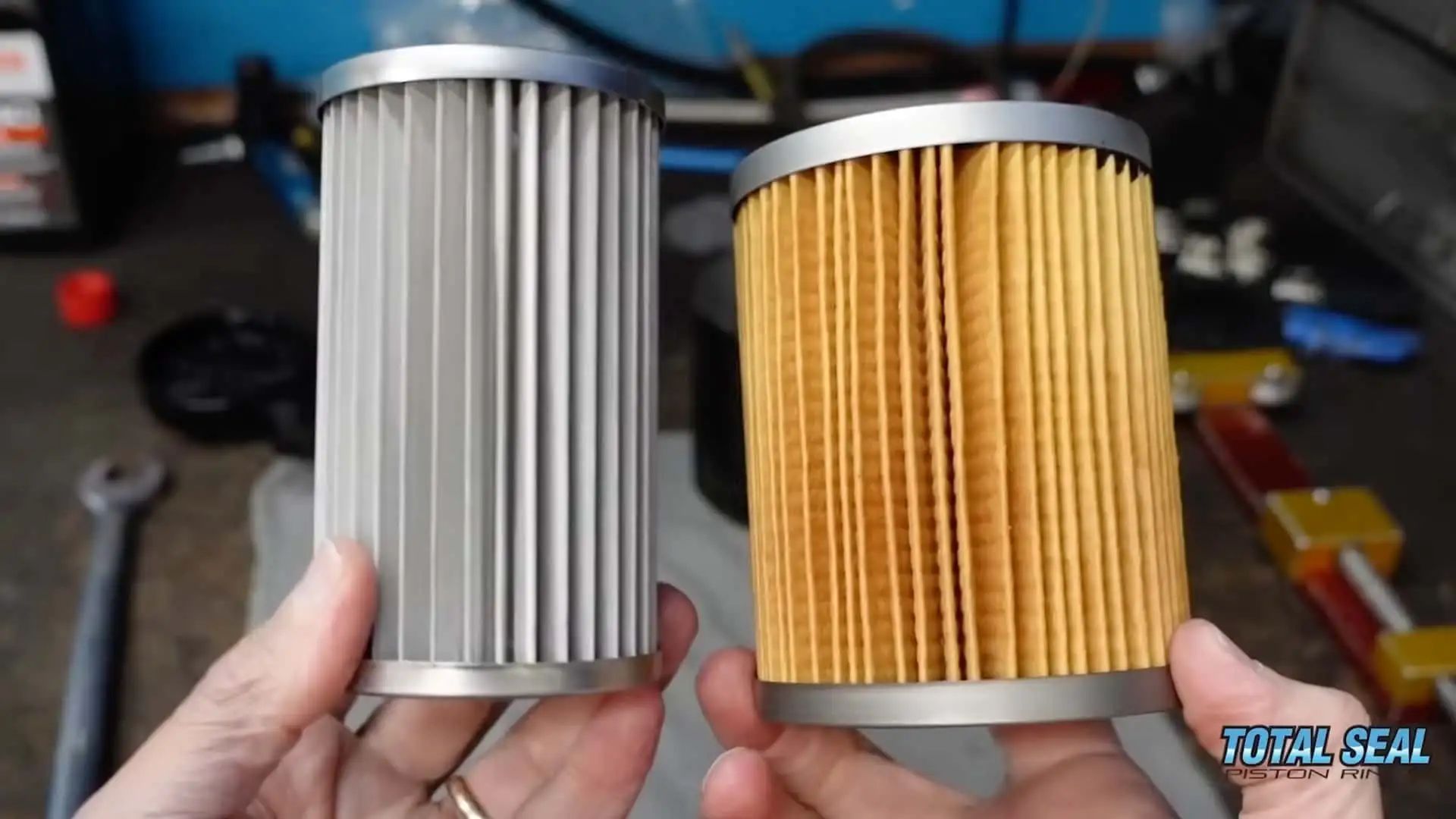 metal-oil-filter-side-by-side-next-to-paper-oil-filter-comparison