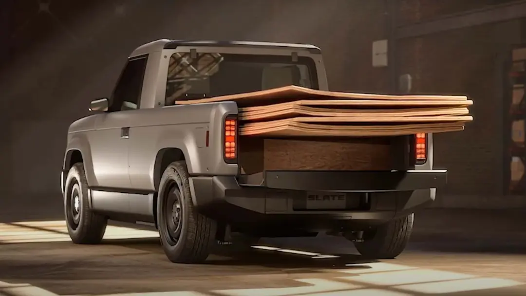 slate-truck-exterior-rear-carrying-plywood-sheets
